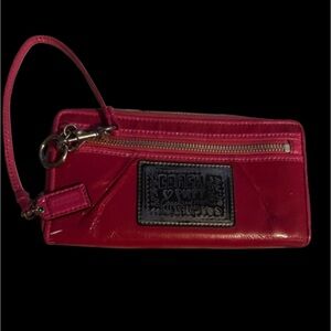 Coach Poppy patent leather dark pink wallet